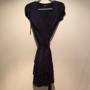 Purple wrap dress with feminine details